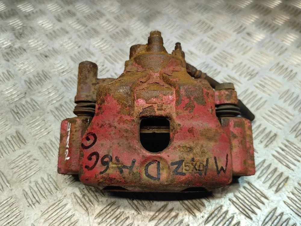 Суппорт тормозной передний левый Mazda 6 GG