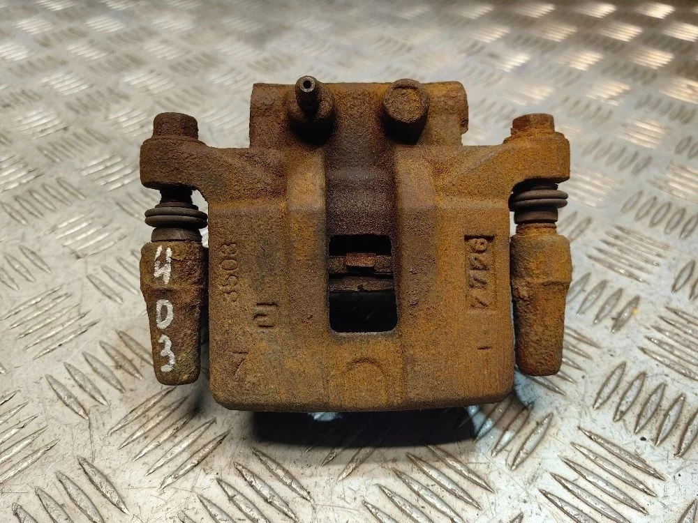 Суппорт задний левый Mitsubishi Lancer X