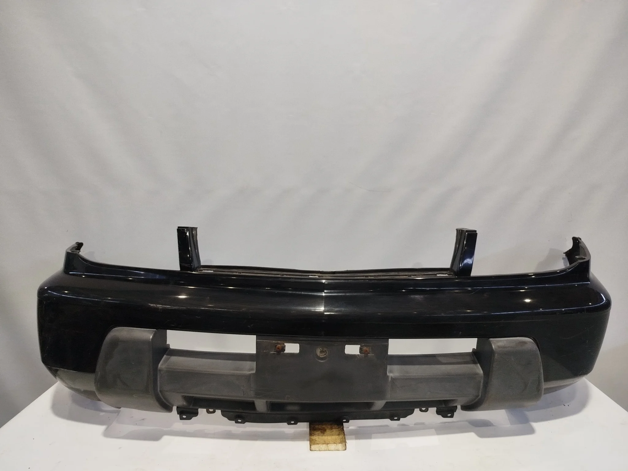 БАМПЕР NISSAN F20228H4MC ПЕРЕД черный, KH3 XA6150