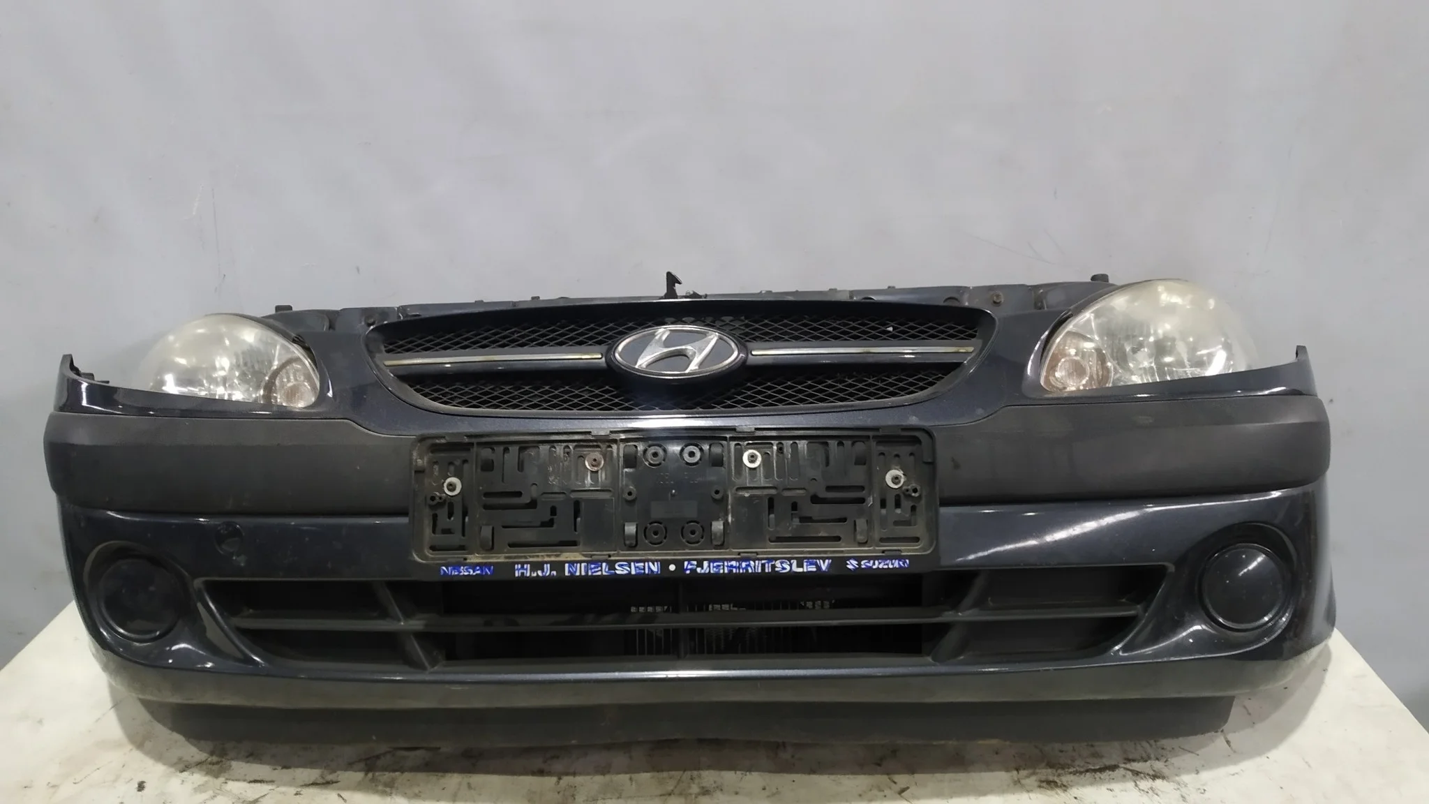 NOSECUT HYUNDAI 865111C310 серый DY573