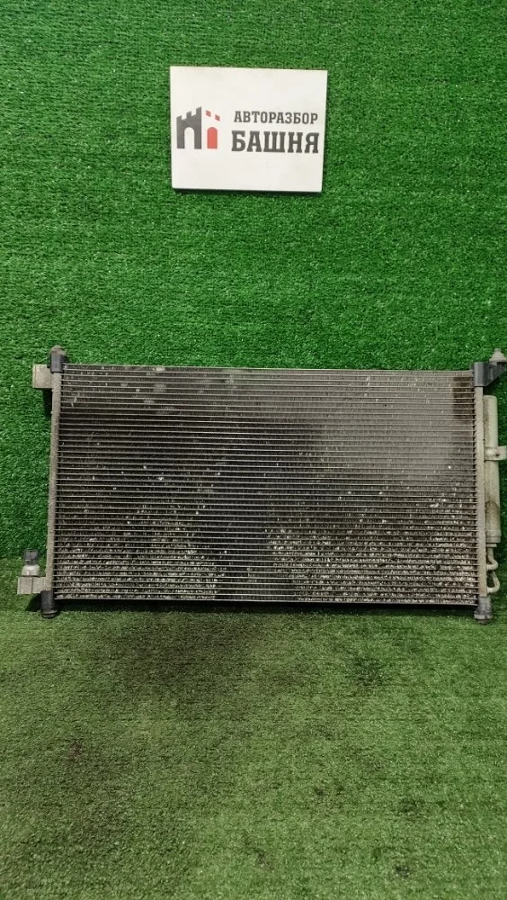 Радиатор кондиционера Nissan Tiida 2010 92100ZW40A C11 HR16DE