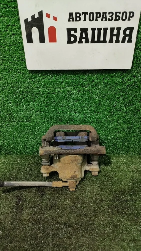 Суппорт Nissan Tiida 2010 44011EM11A C11 HR16DE, задний левый