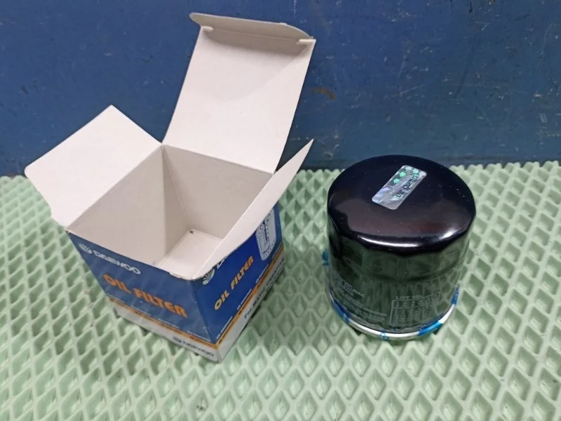 Фильтр масляный Chevrolet Aveo 1 2012 25181616 T255 1.2