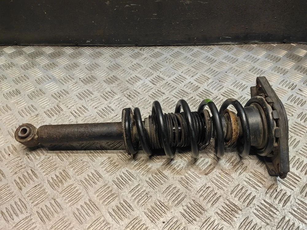 Амортизатор задний Nissan Primera P11