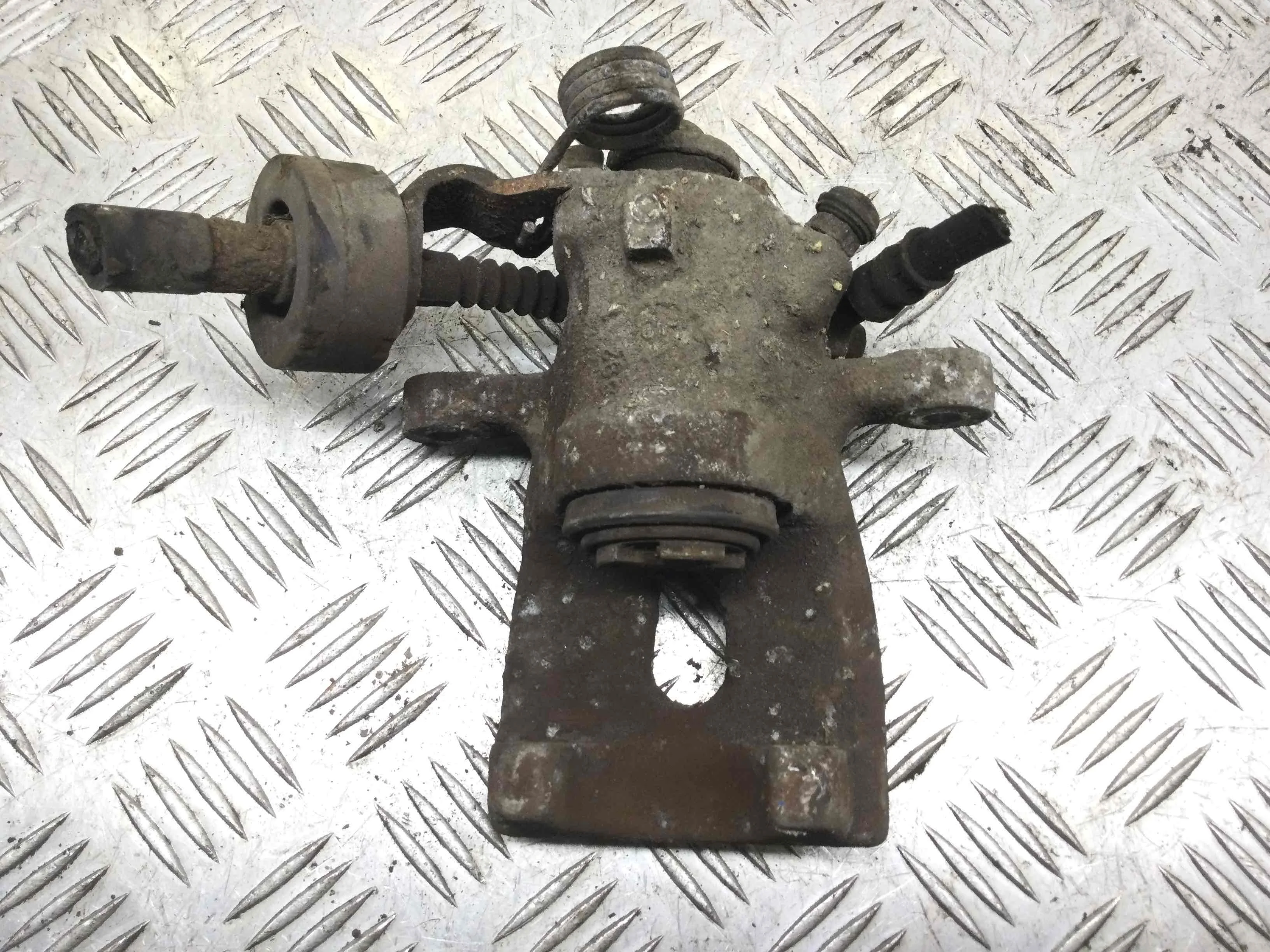 Суппорт задний левый Opel Astra Astra G 1998 - 2004 бензин 1.2 i Механика Х/б