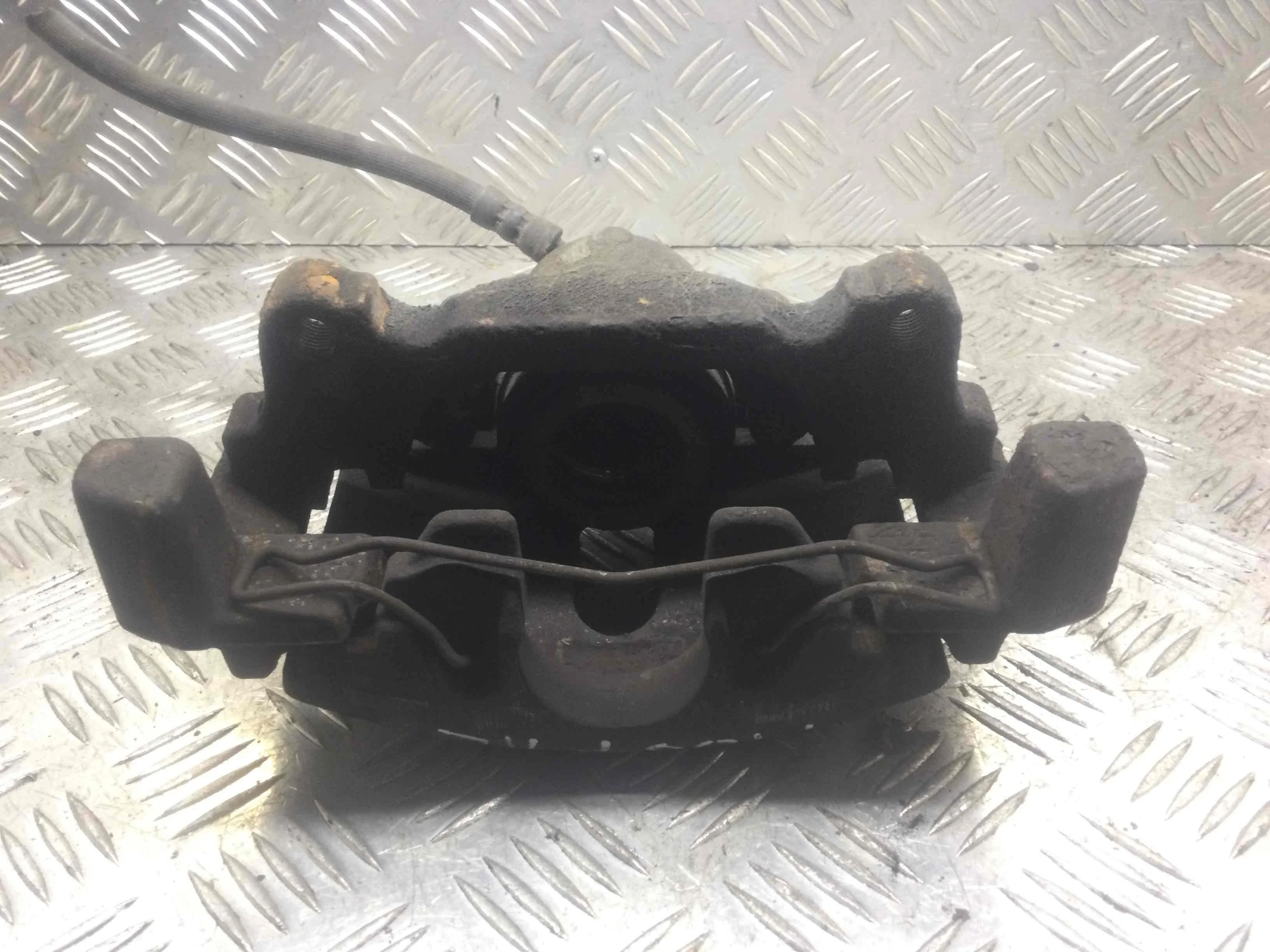 Суппорт передний левый Audi A3 8P/8PA [рестайлинг] (2004-2008) бензин 2.0 FSI Механика Х/б