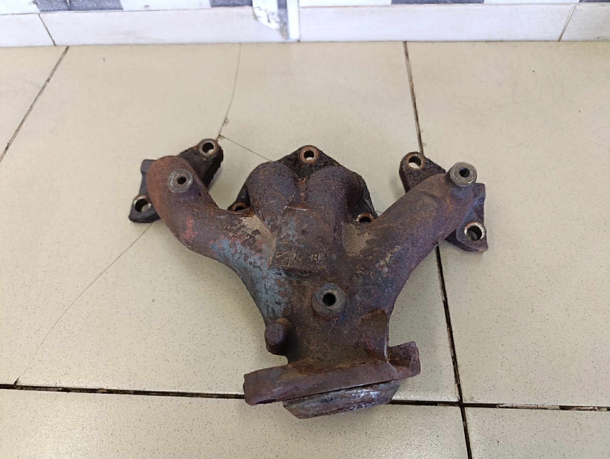 Коллектор выпускной Logan 2005-2014