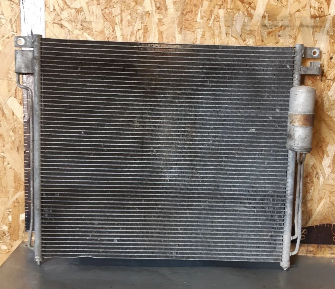 Радиатор кондиционера Nissan Navara D40 (2004—2010) 2008 серебристый