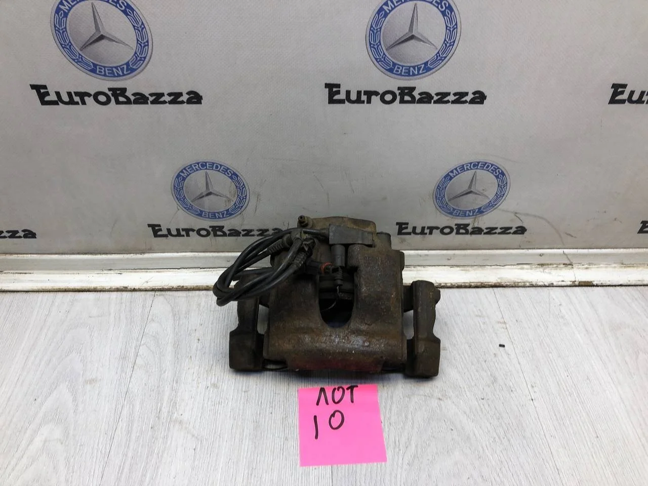 Тормозной суппорт передний  Mercedes W210