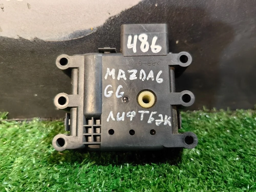 Моторчик заслонки отопителя Mazda 6 GG