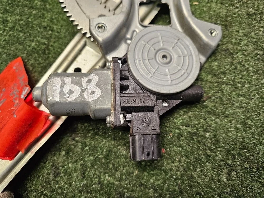 Моторчик стеклоподъемника Mitsubishi Outlander