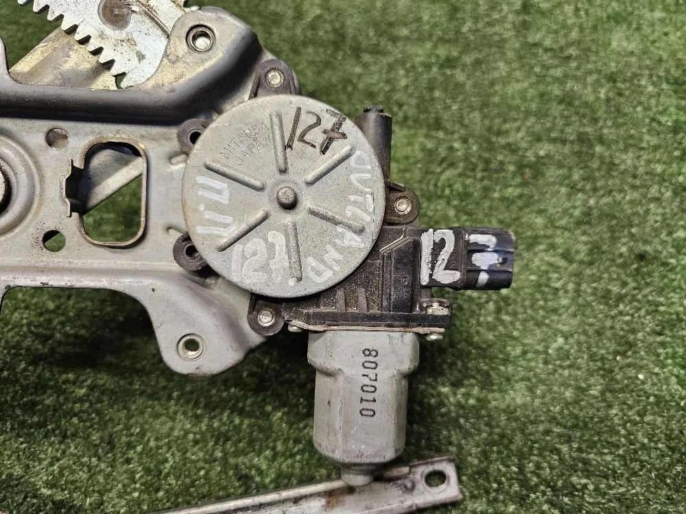 Моторчик стеклоподъемника Mitsubishi Outlander