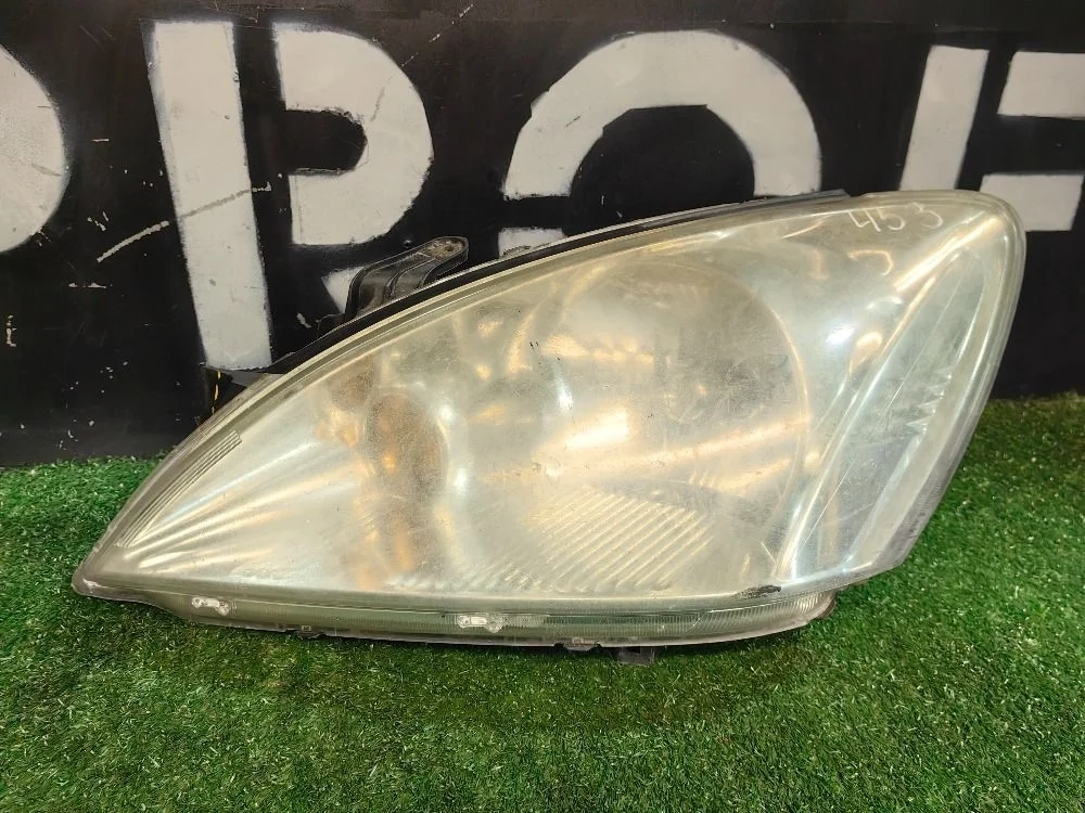Фара левая Mitsubishi Lancer IX