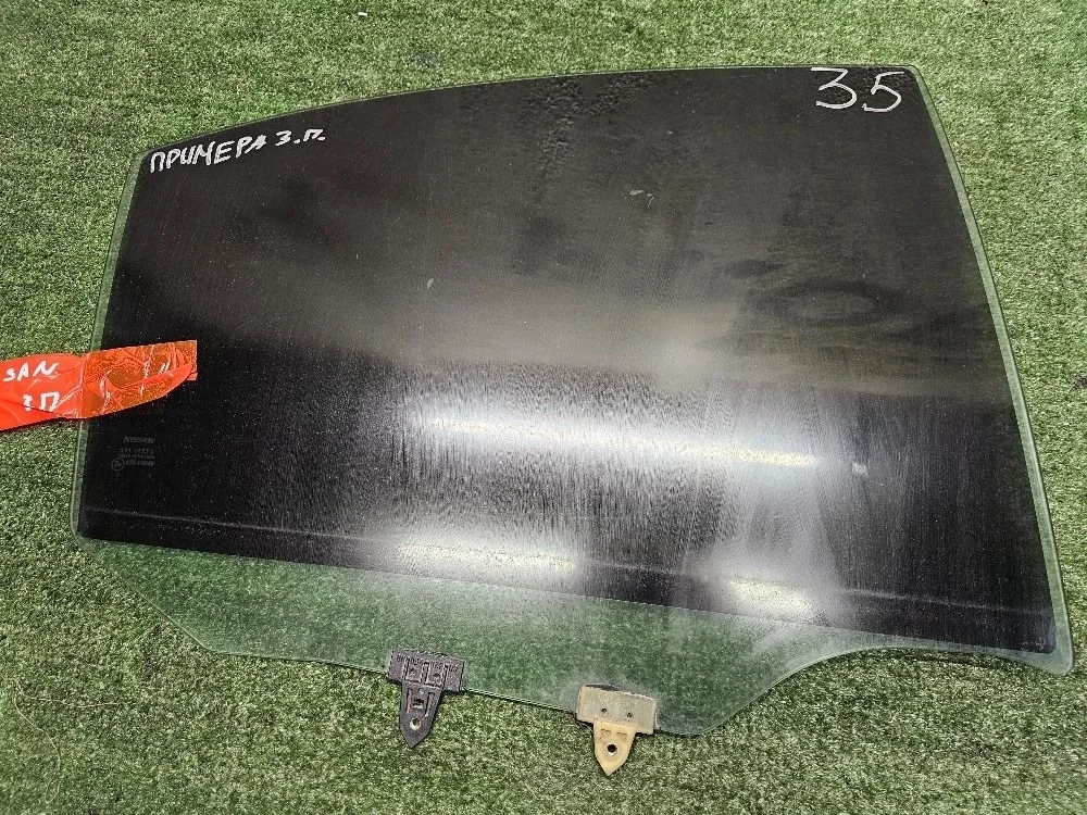 Стекло двери задней правой на Nissan Primera P12