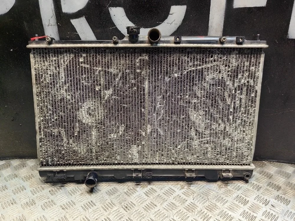 Радиатор охлаждения Mitsubishi Lancer 9