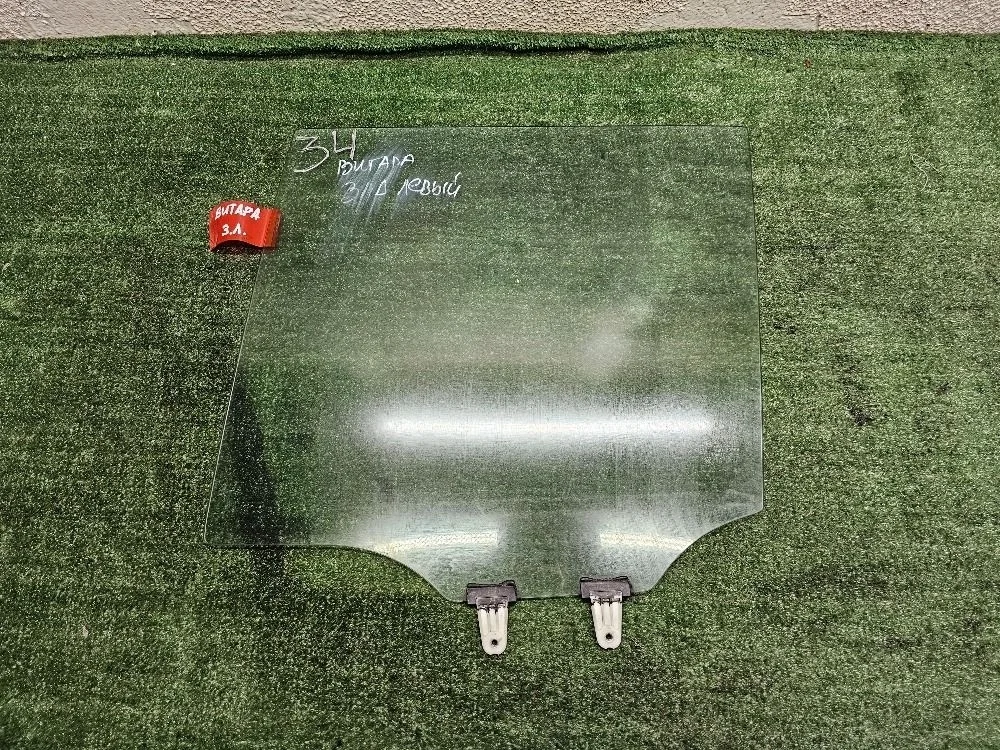 Стекло двери задней левой на Suzuki Grand Vitara 2