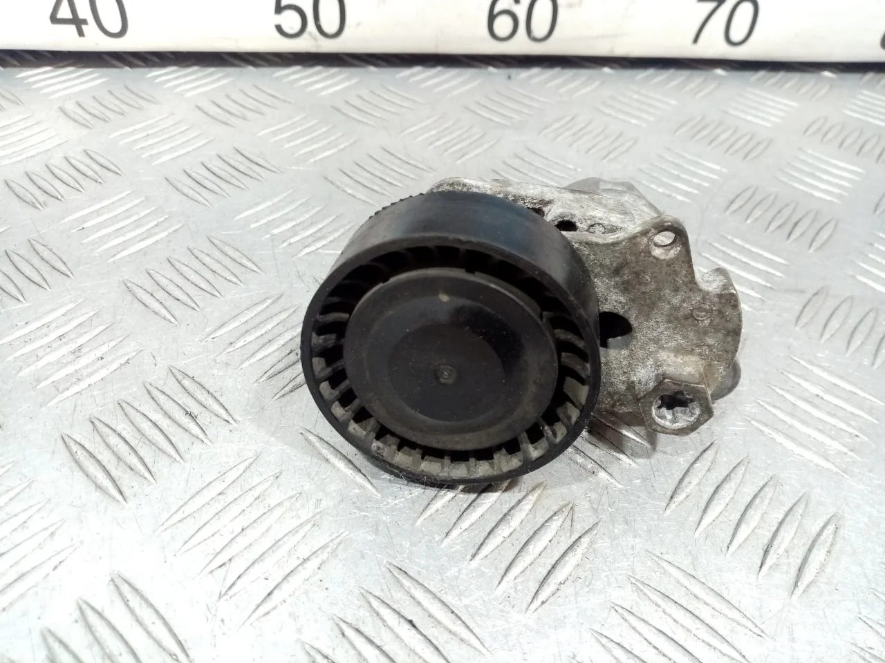 [Б/У] Натяжитель ремня [Код: 00642804 ]