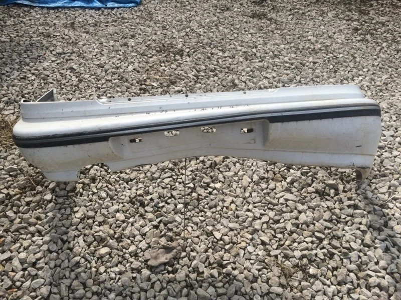 Бампер Daewoo Nexia 1997 - 2004 96216629, задний