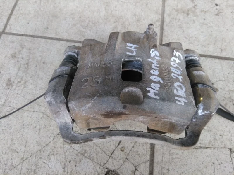 Суппорт тормозной Kia Magentis 2000 - 2005 581803CA00, передний левый