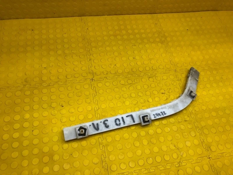 Кронштейн бампера Mitsubishi Lancer 6410A199 X, задний левый