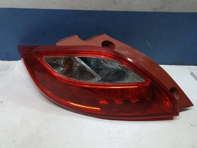Фонарь Mazda Demio 2011 D65151160 DE, задний левый