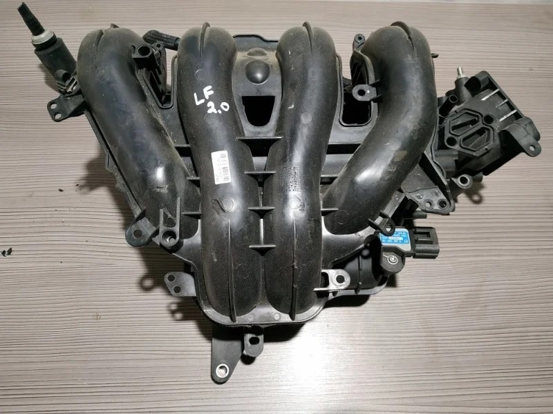 Коллектор впускной Mazda 3 LF6213100 BK 2.0