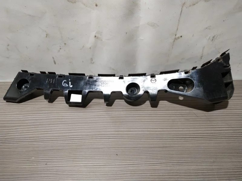 Кронштейн бампера Mazda 6 GJR9502H1 GJ, задний правый