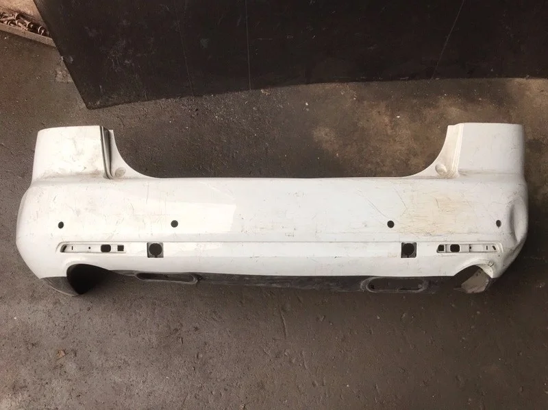 Бампер Mazda CX-7 2006-2010 EG2150221, задний