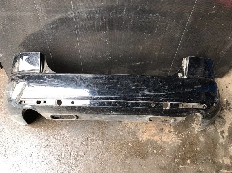 Бампер Mazda CX-7 2006-2012 EG2150221, задний