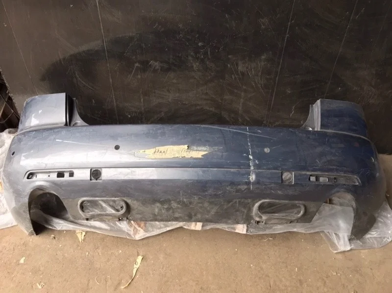 Бампер Mazda CX-7 2006-2012 EG2150221, задний