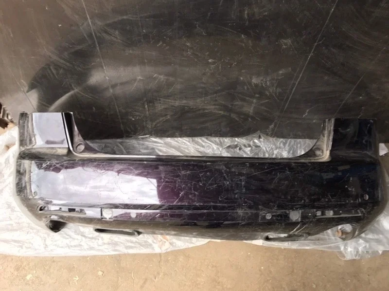 Бампер Mazda CX-7 2006-2012 EG2150221, задний