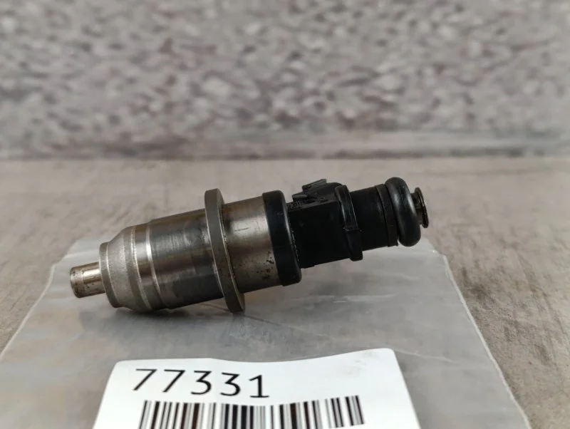 Форсунка топливная Mitsubishi Lancer Cedia 2002 CS5W