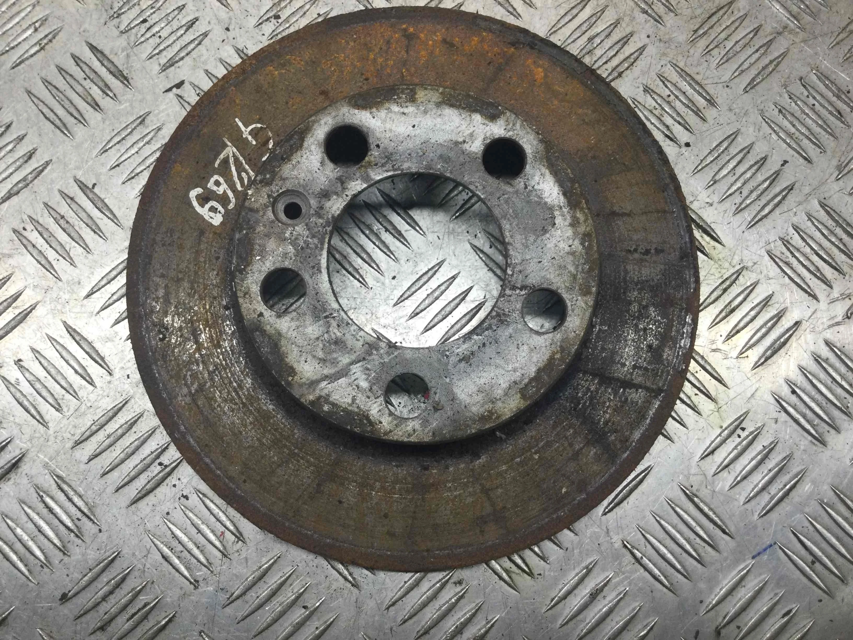 Диск тормозной задний Volkswagen Golf 4 поколение (1997-2004) бензин 1.4 i Механика Х/б