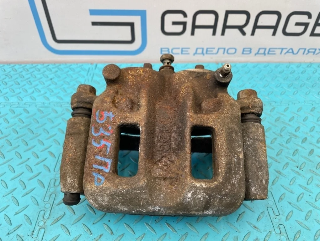 Суппорт Mitsubishi Pajero 2004 MR510538 V73W 6G72 3.0, передний правый