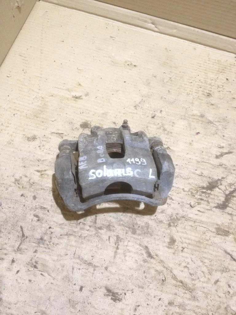 Суппорт передний левый Hyundai Solaris 1 RB