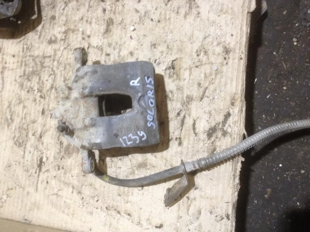 Суппорт передний правый Hyundai Solaris 1 RB