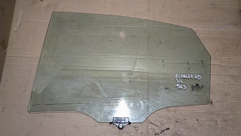 Стекло двери задней левой Hyundai Elantra HD