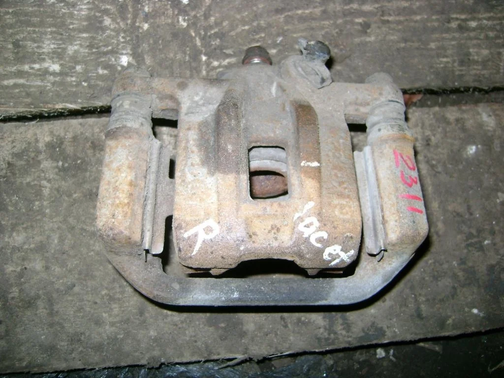 Суппорт задний правый Chevrolet Lacetti J200