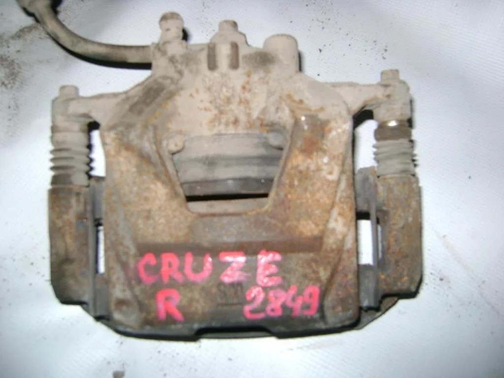 Суппорт передний правый Chevrolet Cruze J300