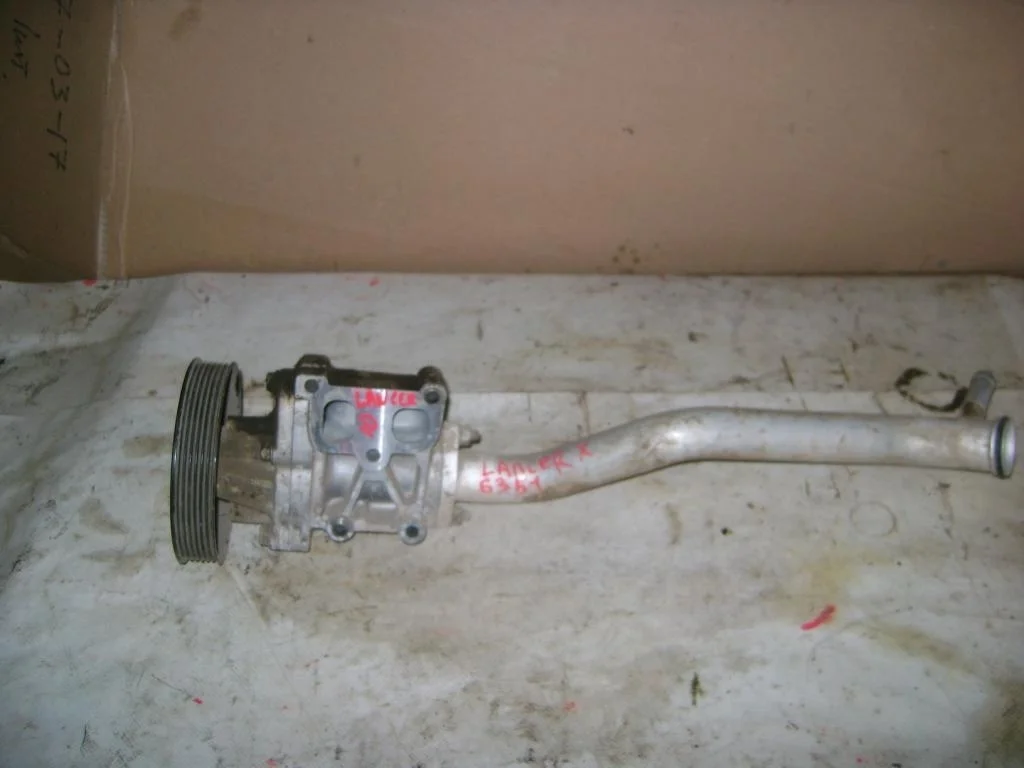 Помпа Mitsubishi Lancer 10 CY