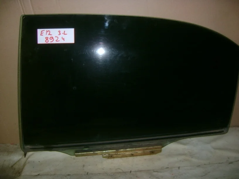 Стекло двери задней левой Toyota Corolla E120