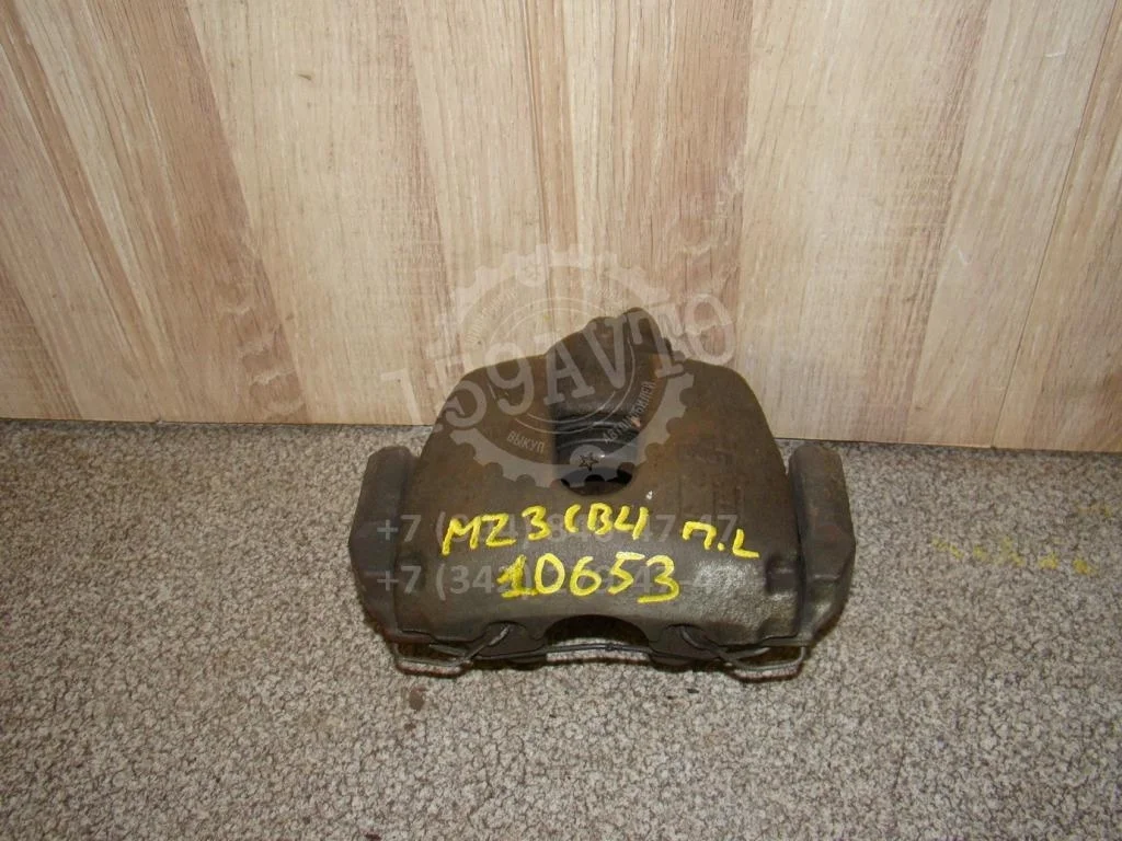 Суппорт передний левый Mazda 3 BL