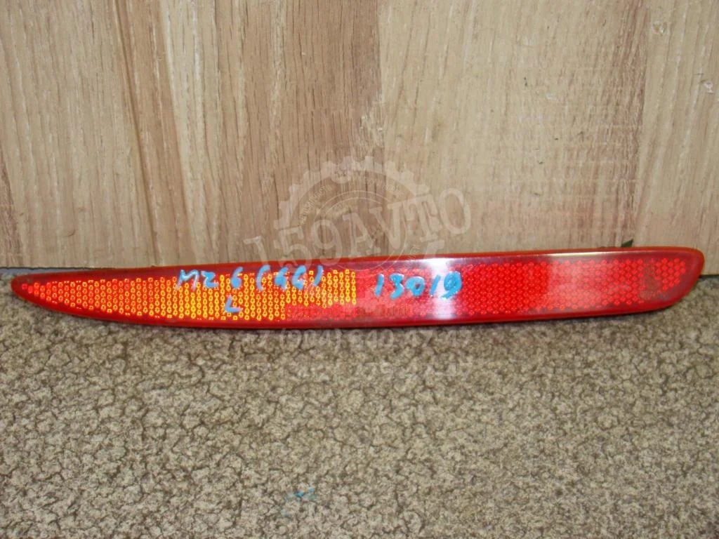 Отражатель в бампер задний левый Mazda 6 GG