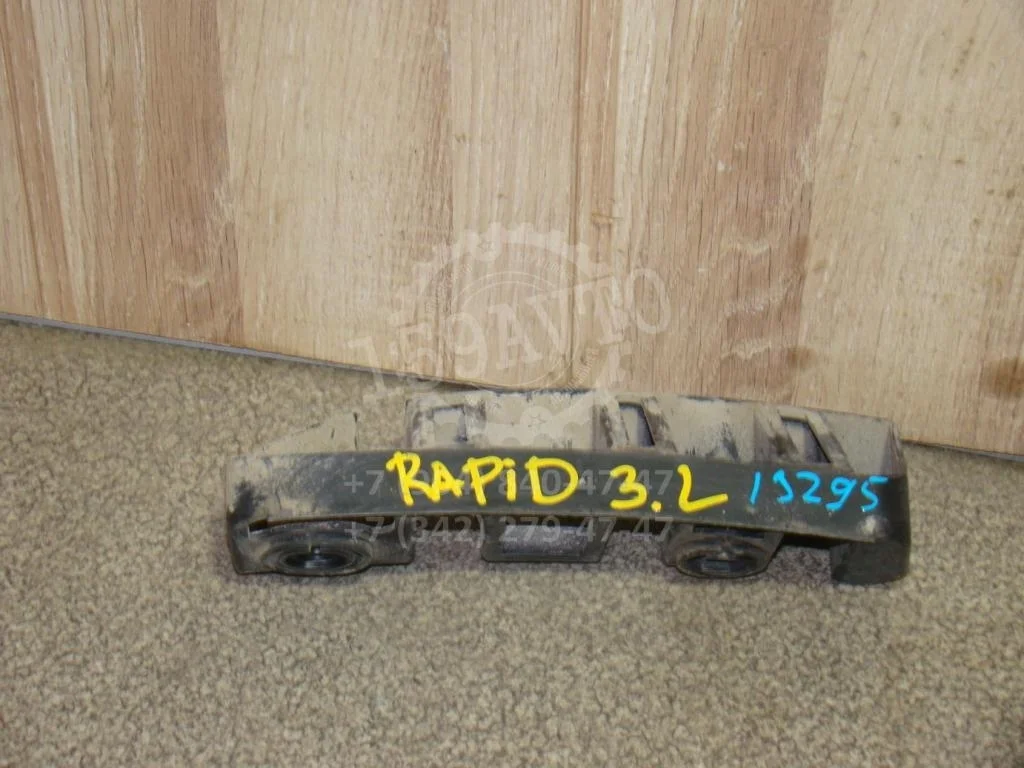 Кронштейн заднего бампера левый Skoda Rapid 1 2014