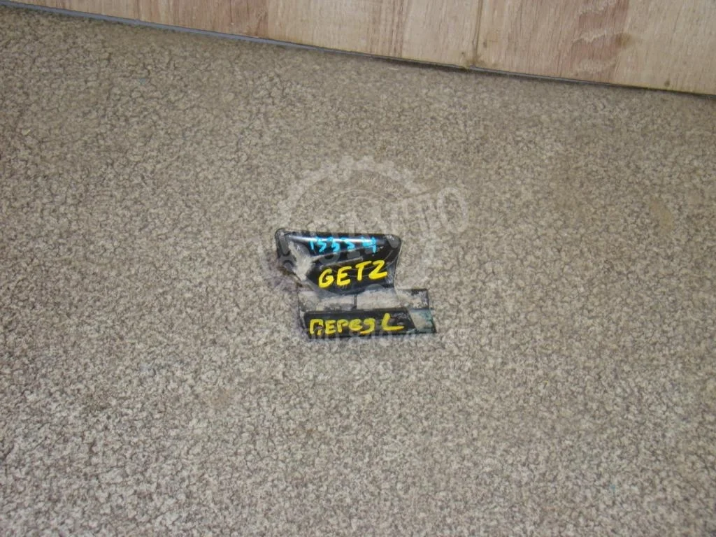 Кронштейн переднего бампера левый Hyundai Getz 2003 TB