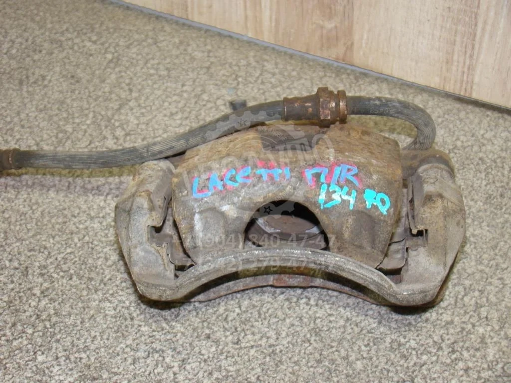 Суппорт передний правый Chevrolet Lacetti 2007 J200