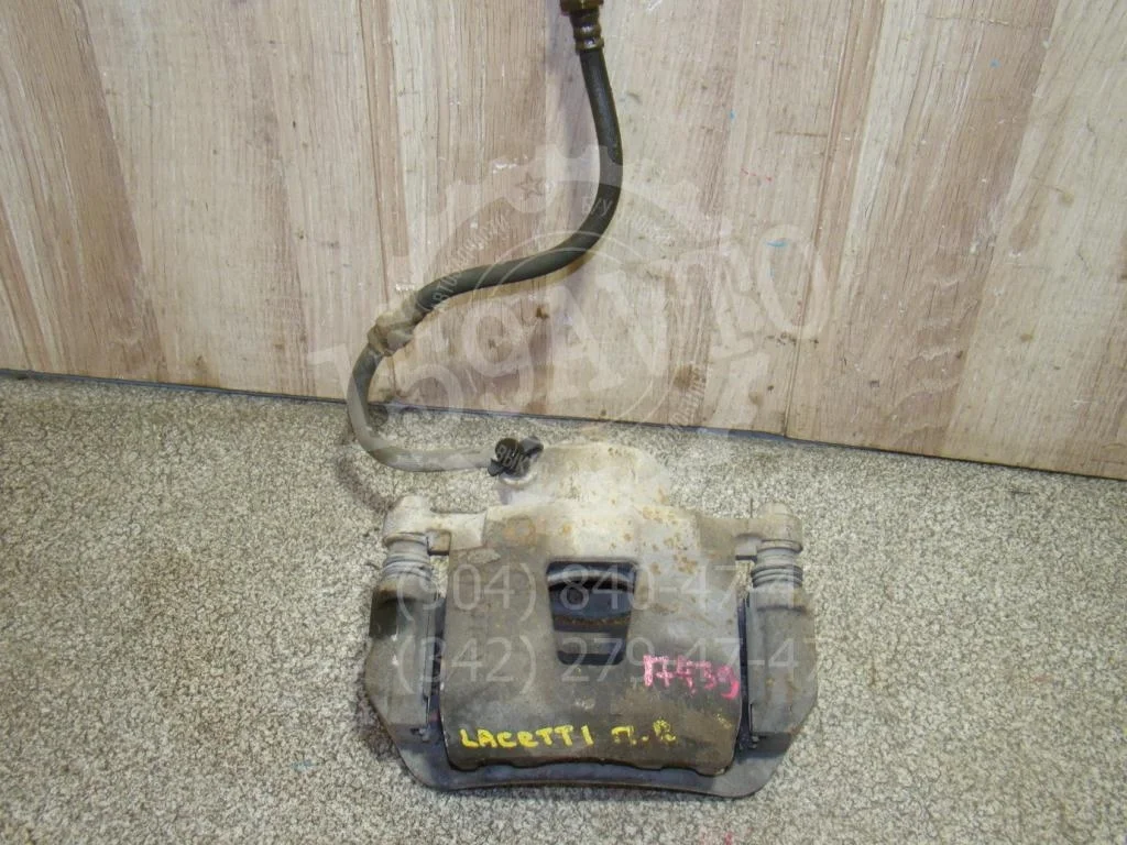 Суппорт передний правый Chevrolet Lacetti 2011 J200