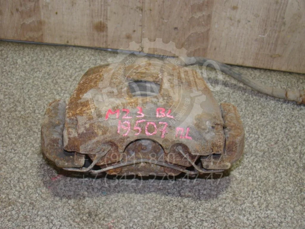 Суппорт передний левый Mazda 3 BL