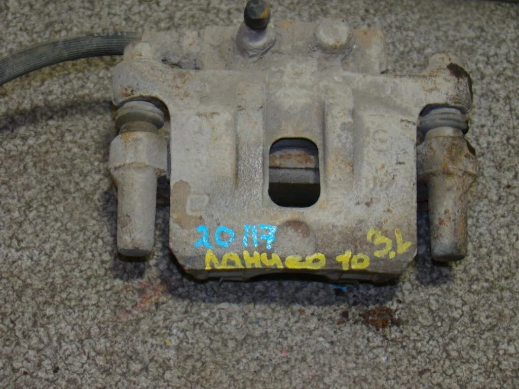 Суппорт задний левый Mitsubishi Lancer 10 CY