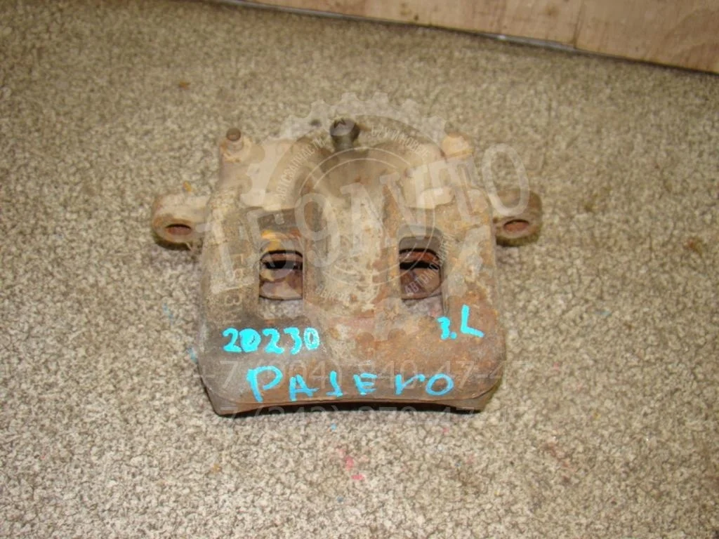 Суппорт задний левый Mitsubishi Pajero 3 V60, V70